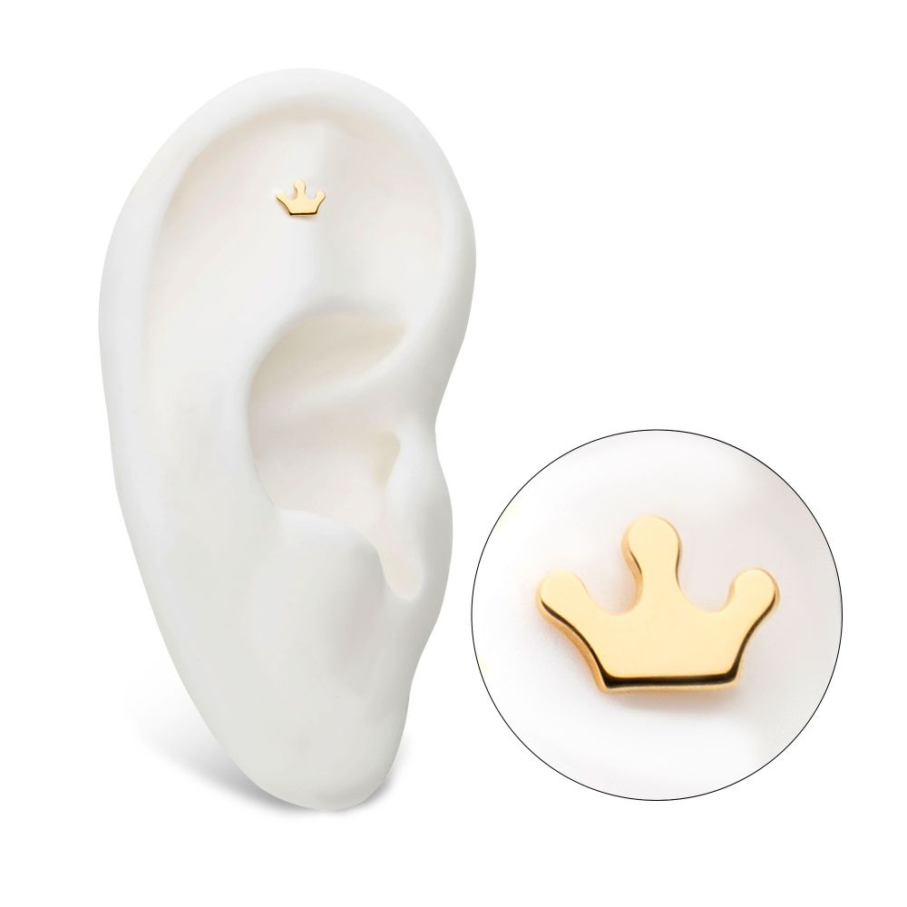 An ear wearing the 14K Crown Cut-Out earring. An ear wearing the 14K Crown Cut-Out earring.