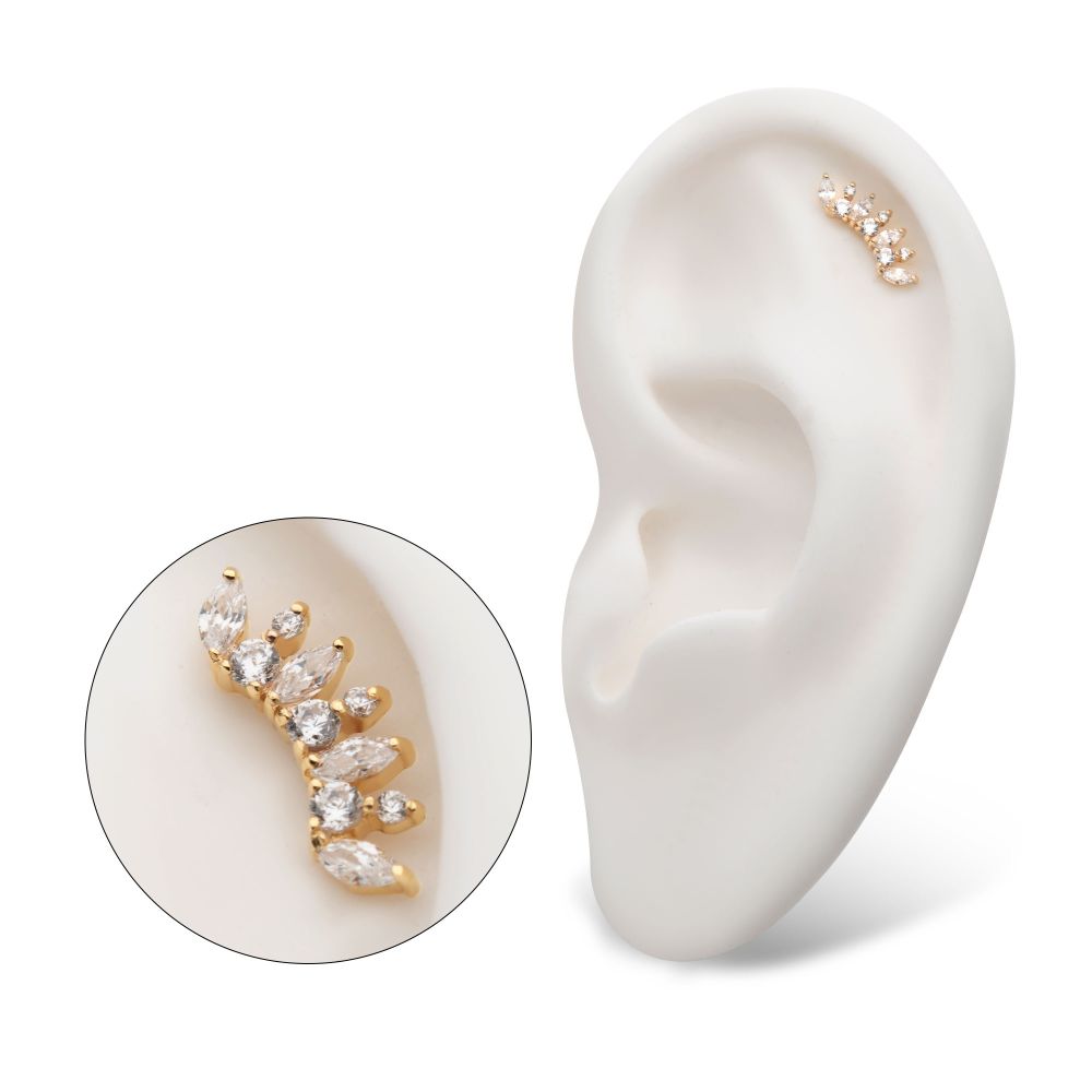 The 14K Marquise Curved Cluster ear climber, featuring multiple marquise-cut clear stones, is displayed on a white ear model with a close-up inset highlighting its sparkling details. The 14K Marquise Curved Cluster ear climber, featuring multiple marquise-cut clear stones, is displayed on a white ear model with a close-up inset highlighting its sparkling details.