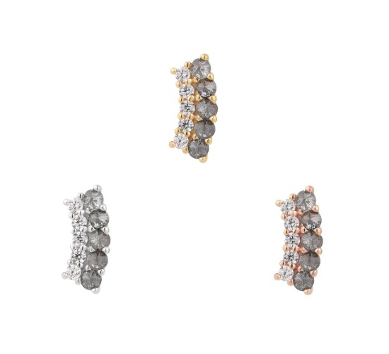 Three curved earrings, each featuring a row of dark round stones bordered by smaller clear stones, set in different metal tones: gold, silver, and rose gold, displayed against a white background.