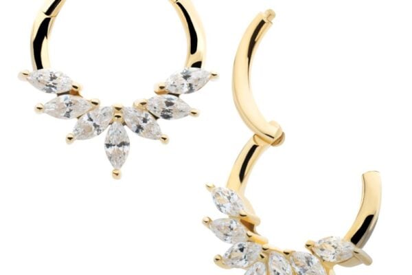 The 14K Marquise Wreath Clicker features gold hoops, each with five marquise-cut clear gemstones in a fan arrangement on the lower half. One earring is closed while the other is slightly open to display the clasp.