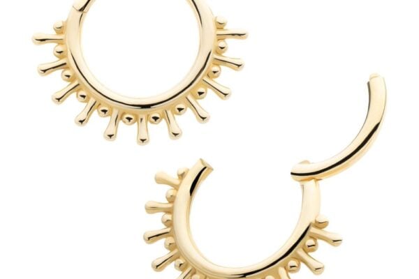 The 14K 11 Spiked Clicker features two gold hoop earrings, each adorned with small, evenly spaced rounded spikes along the lower half, set against a white background.