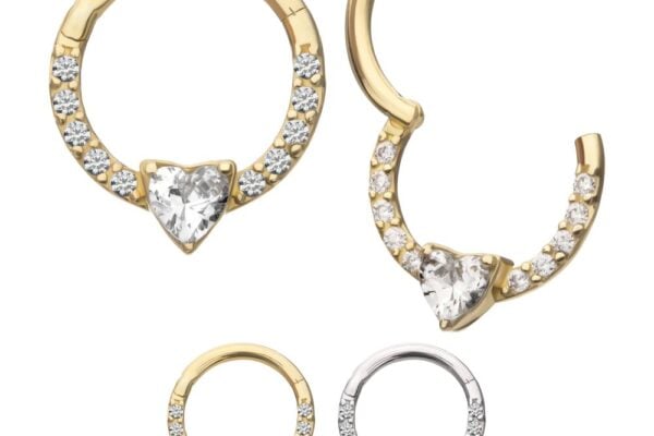 The 14K Heart Clicker set includes four hoop earrings with heart-shaped gemstones and round crystals: two gold, one rose gold, and one silver. One gold hoop is open to reveal the clasp.