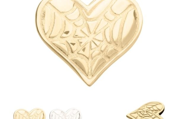 The 14K Spiderweb Carved Heart is a heart-shaped pin with a spiderweb design, available in gold and silver finishes, and includes a side view highlighting the pin backing.