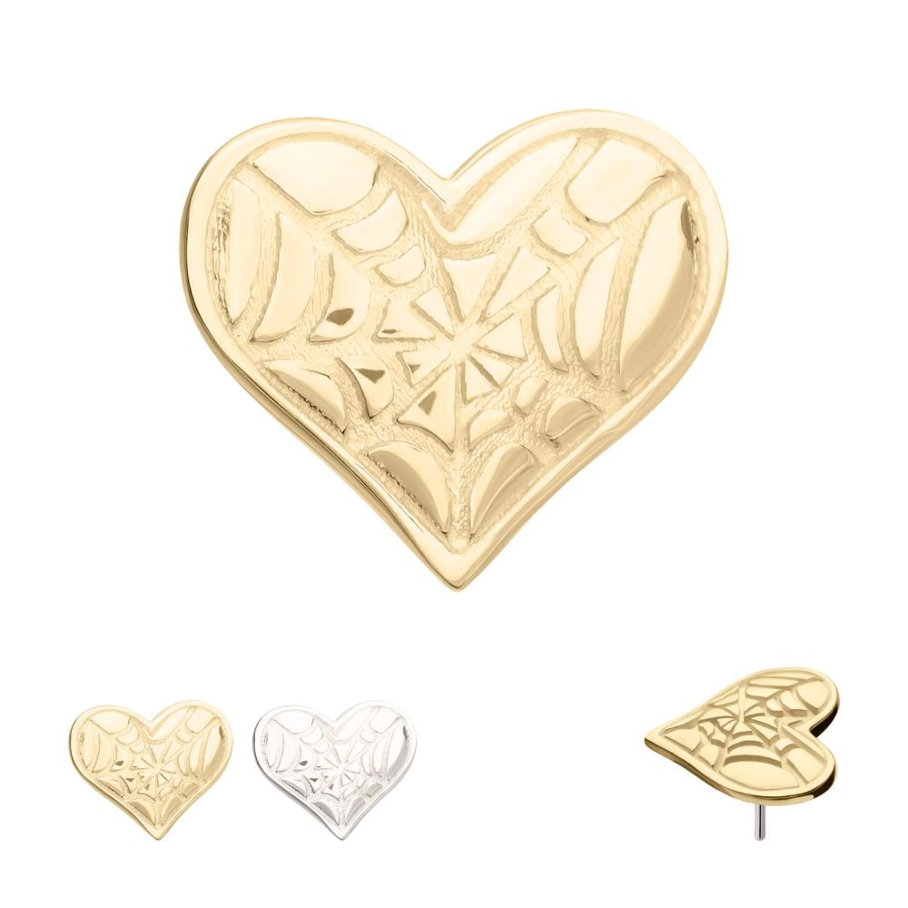 The 14K Spiderweb Carved Heart is a heart-shaped pin with a spiderweb design, available in gold and silver finishes, and includes a side view highlighting the pin backing.