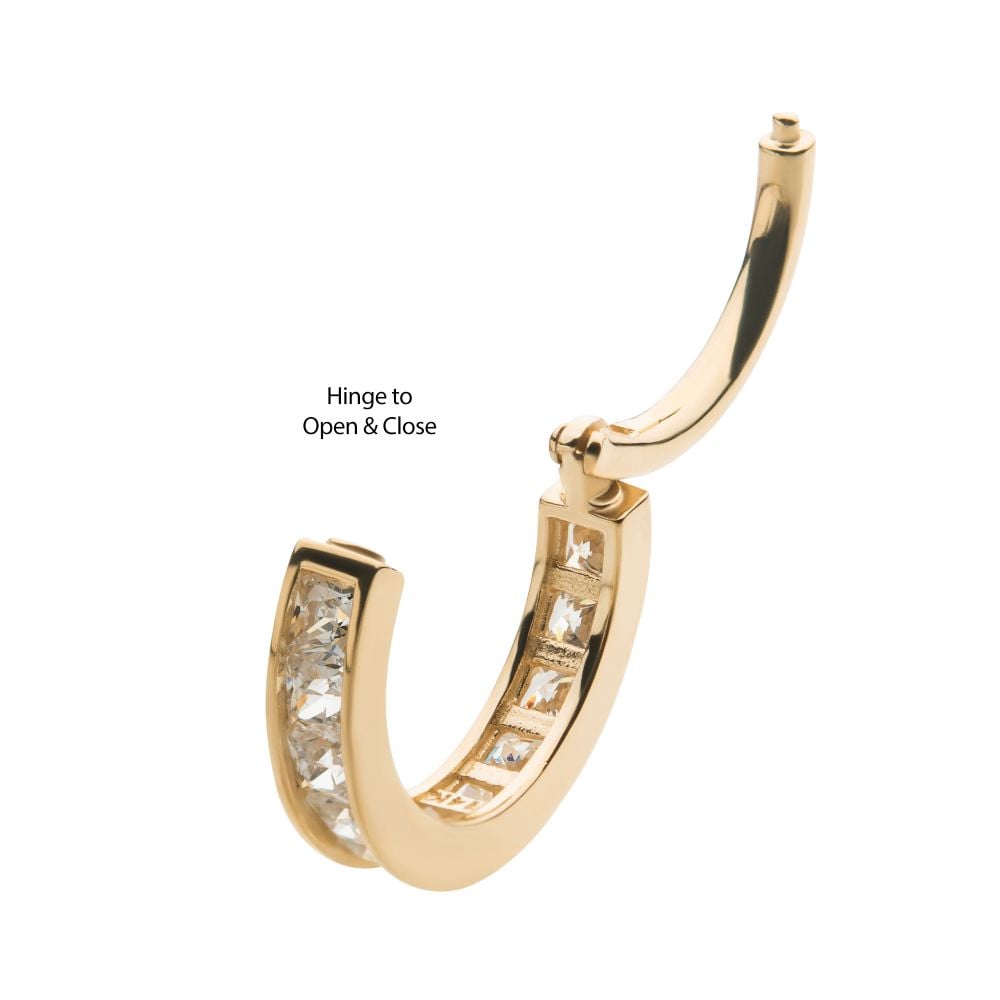 The 14K Princess Side Clicker is a gold hoop earring featuring square-cut gemstones and a labeled hinge mechanism reading “Hinge to Open & Close. The 14K Princess Side Clicker is a gold hoop earring featuring square-cut gemstones and a labeled hinge mechanism reading “Hinge to Open & Close.