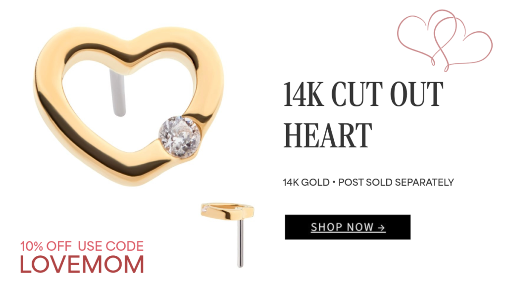 A gold 14K heart-shaped earring with a cut-out center and a single gemstone. Text offers 10% off with code LOVEMOM and reads 14K Cut Out Heart, 14K gold, post sold separately. A Shop Now button is shown.