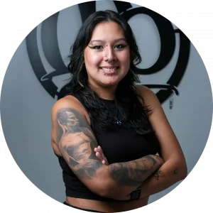 Mari Almanza, professional piercer at Master Pierce, performing a nostril piercing